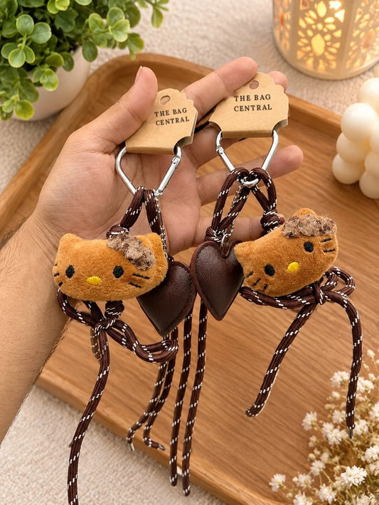 Cocoa Kitty Heart Bag Charm – plush kitty with brown leather heart and cord tassels