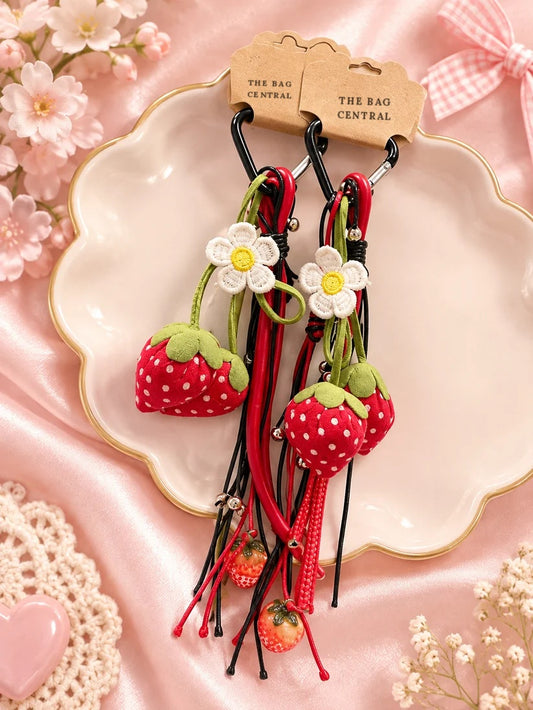 Strawberry Blossom Crochet Bag Charm – crochet strawberries with a white daisy and red cord tassels